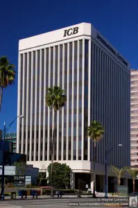 Building of a bank, beautiful scyscraper, nice weather, we can see palm trees in the picture as well
